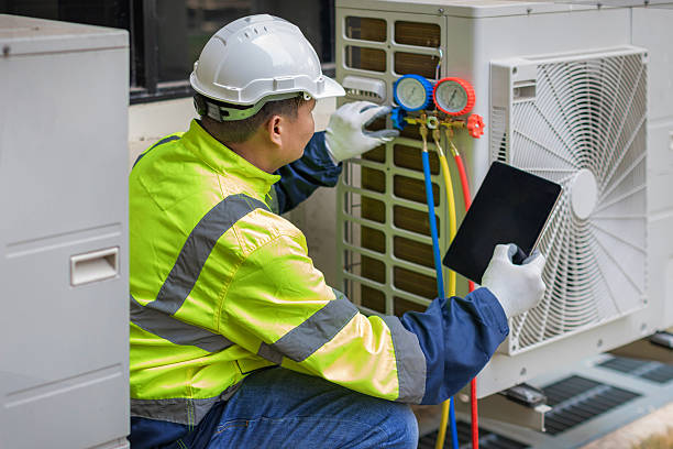 Professional Ductwork Repair technician working in Harvey, ND